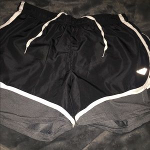 Athletic shorts with spandex inside